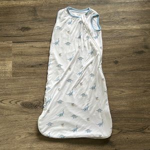 White Kyte Baby sleep sack with blue dinosaur design. Size small .5 tog